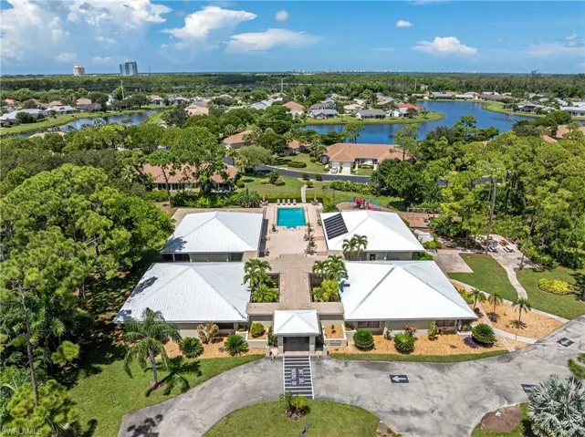 Aerial view of residential area with a large body of water