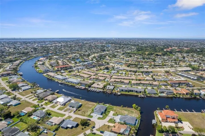 Bird's eye view with a water view and a residential view