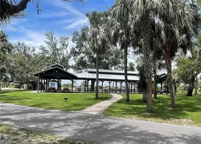 View of home's community featuring a lawn