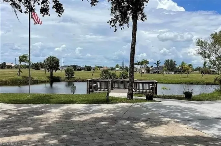 Surrounding community with a water view