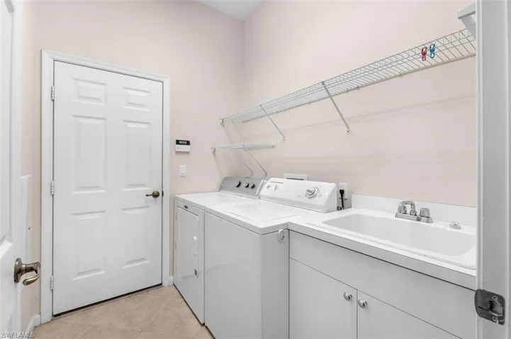 Full size washer/dryer and laundry sink