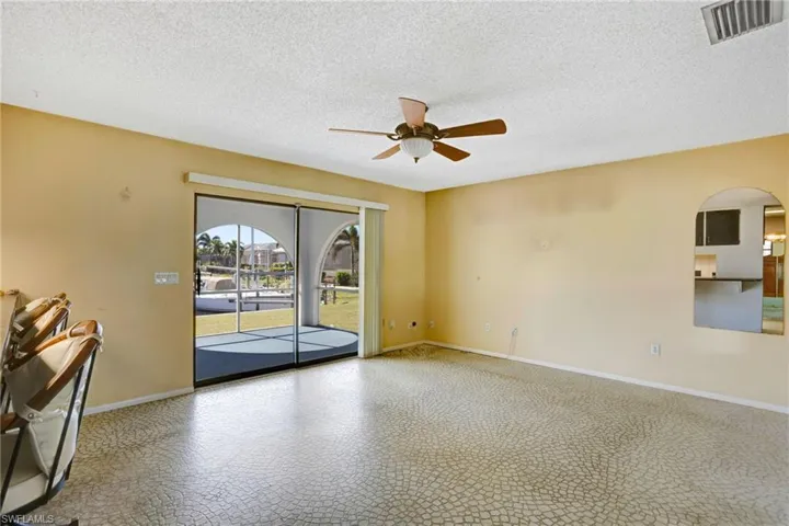 Family room featuring ceiling fan