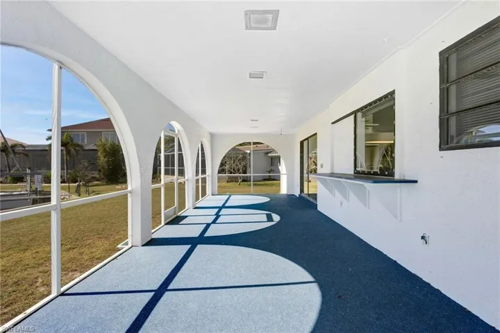 View of large screened patio adjacent to the pool