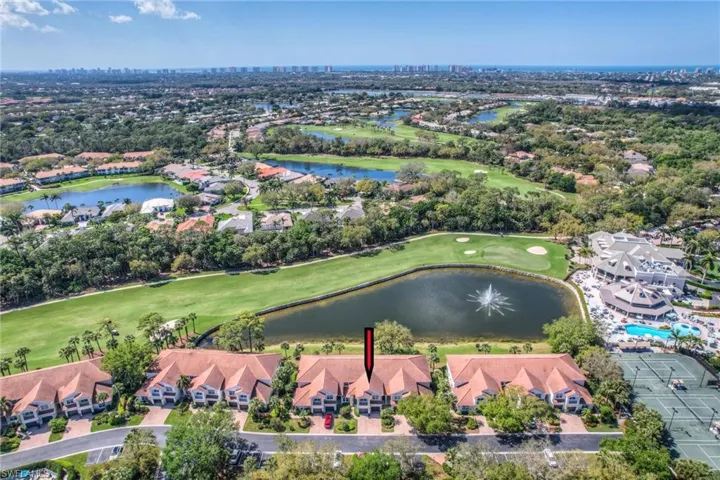 Drone / aerial view featuring 2248 Ashton Oaks Lane #102! Fantastic Location with views of the 18th Fairway and Lake. So close to ALL Stonebridge activities!