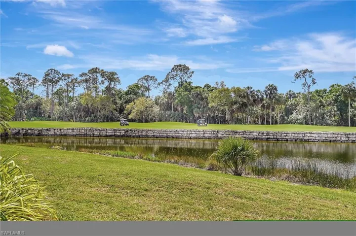 Property view looking left of water and 18th Fairway.