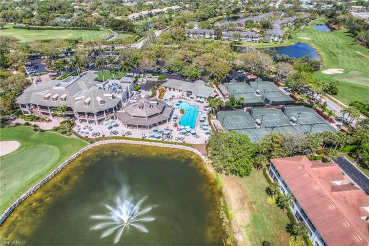 Drone / aerial view with view of Stunning Stonebridge amenities...golf course, a water view, Bistro, Clubhouse and tennis courts.