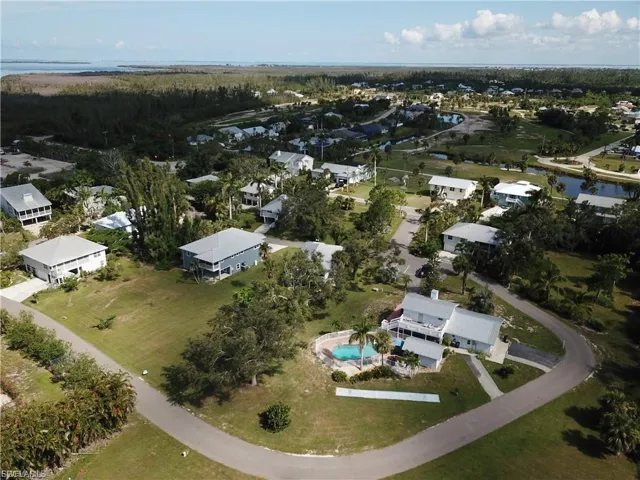 Aerial overview of community pool area and clubhouse