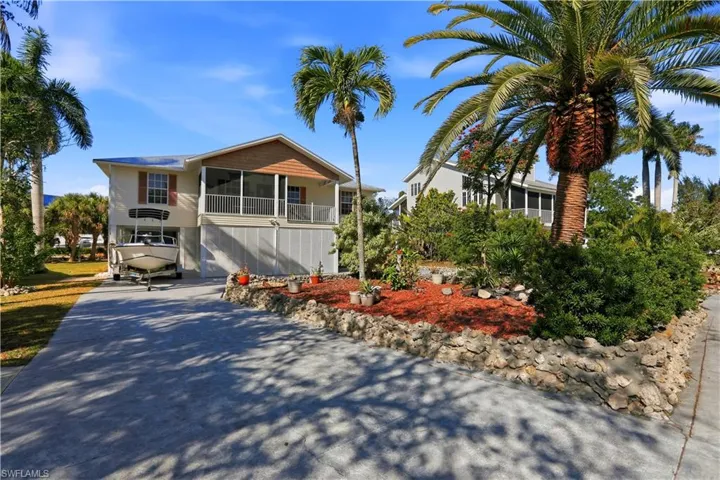 Paved parking and front landscaping