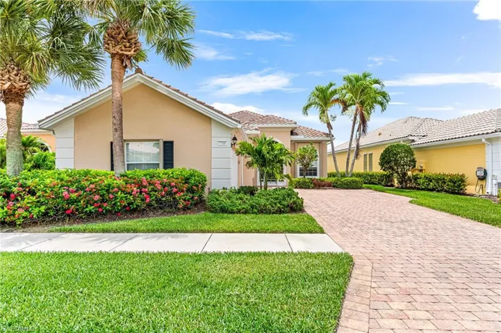 Mediterranean / spanish-style home featuring a front lawn