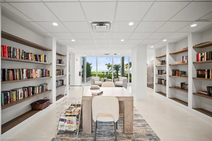 Home office featuring built in features and recessed lighting
