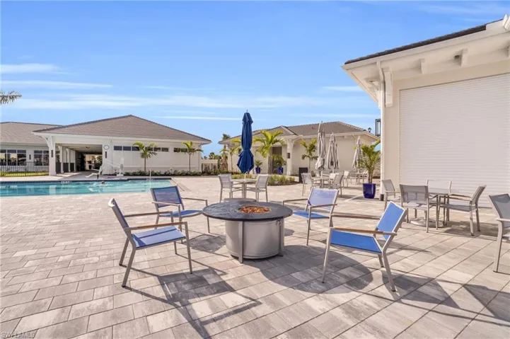 View of patio featuring an outdoor fire pit