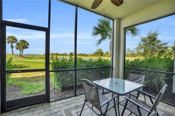Sunroom featuring ceiling fan