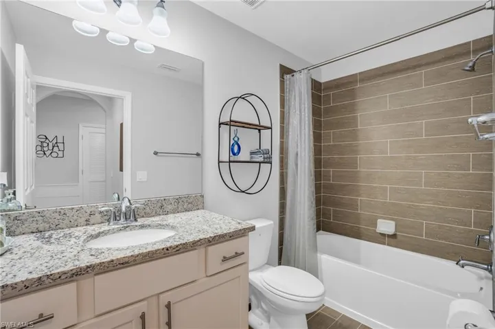 Full bathroom featuring a vanity, and shower / bath combo
