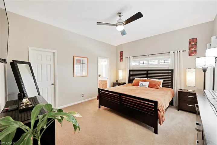 Primary bedroom has en suite bath and walk in closet.