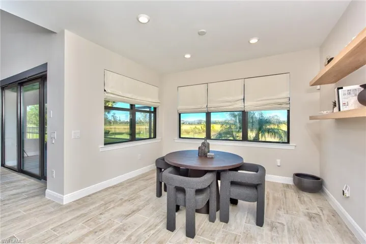 Dining room featuring recessed lighting and light wood-style floors