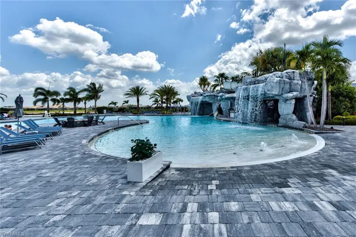 Community pool featuring a patio area