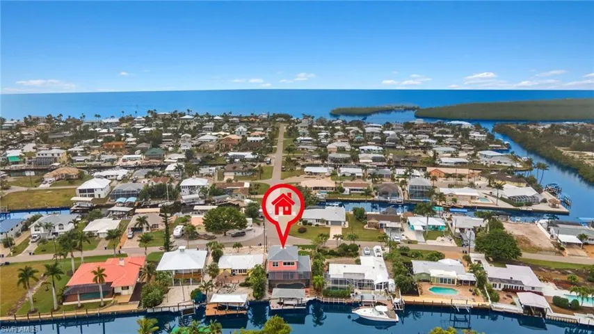 Aerial of home with the Intracoastal Waterway in the background.  Very quick access to the Gulf Mexico.