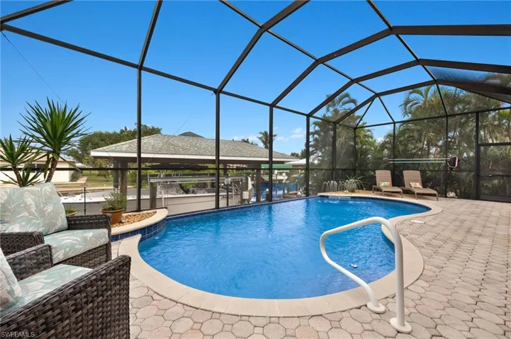 Pool with water feature and no-see-um (20/20) screen.
