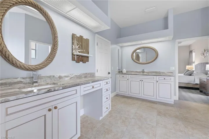 The master bath has 2 separate vanities.