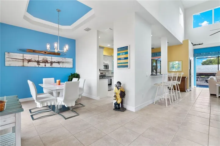 Entry to home with dining room and 20' ceilings in the entry.