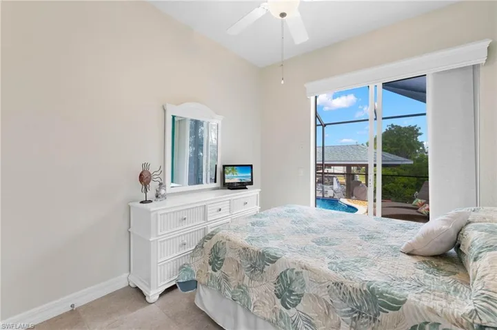 Guest Bedroom #1 with views of the pool.