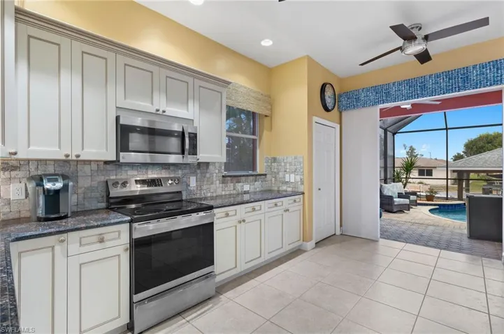 Lots of counter space, a pantry, and sliders to covered lanai.
