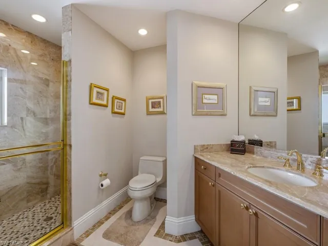 2nd Bedroom Bath with Window View of Gulf in Shower