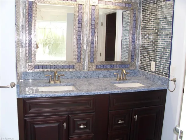 Full bathroom with double vanity