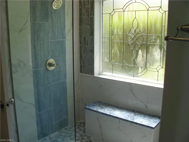 Full bathroom featuring walk in shower
