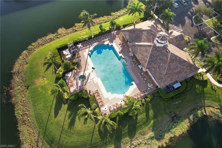 Aerial view of a large body of water and a pool area