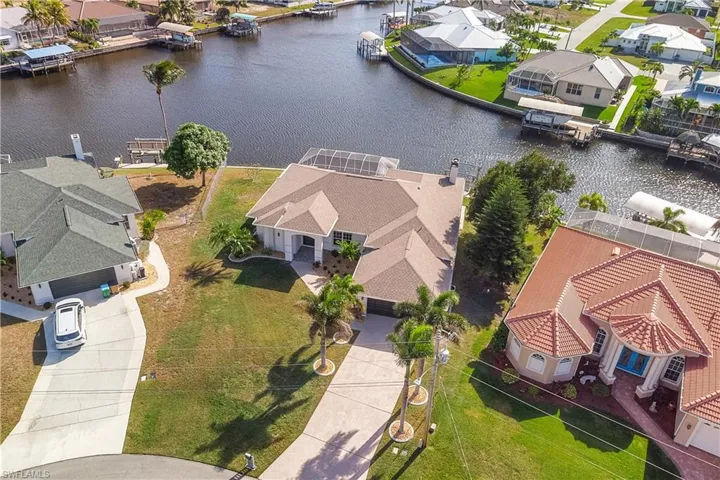 Aerial perspective of property featuring water frontage