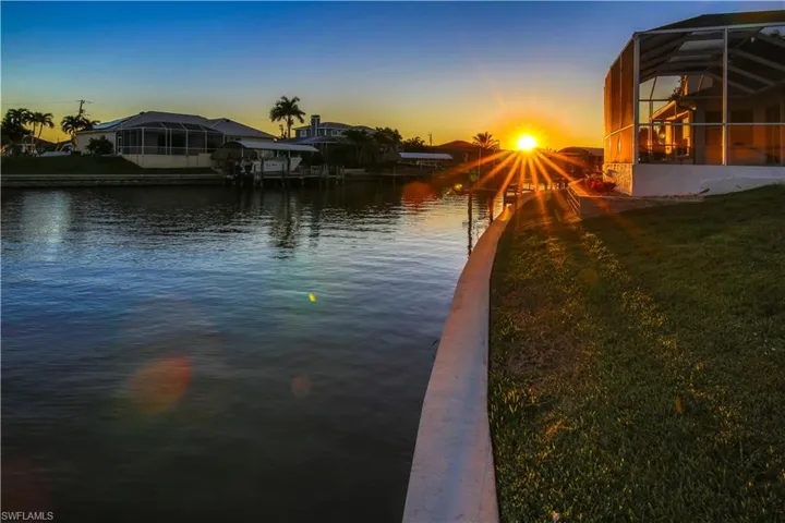 Water view featuring a dock
