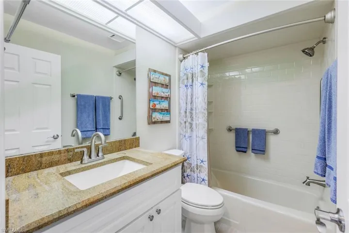 Guest Bath I- Full Size with Tub and Shower, Linen Closet, High Sink with Beach Granite Theme