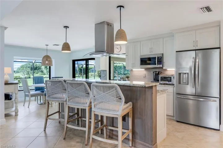 Breakfast Room with Hurricane Sliders and Garden Window Seat