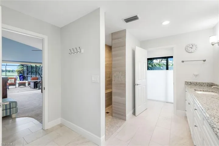 Walk In Shower, Completely Tile- Floor to Ceiling- Shower Room only Small Partial View- 2 Shower Options- Seating Also- Zero Point Entry