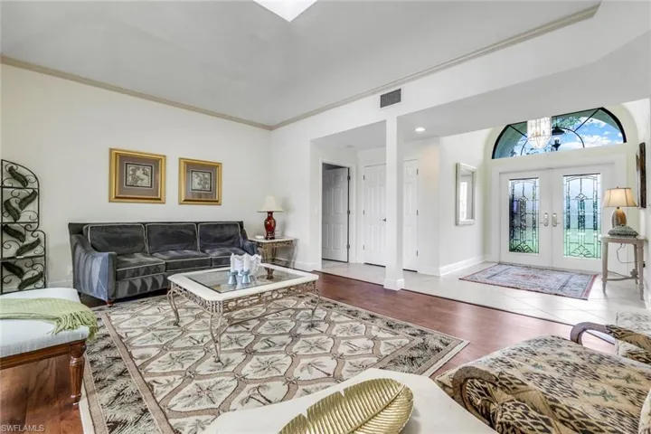 Front Entry Foyer- Glass Doors, Huge Transom Window, Multiple Hurricane Rated Skylights, Keep the Rooms Brights with Natural Light
