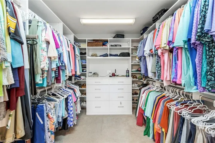 Well Lit Walk In Closet Room with Ample Room- New Closet System & Carpet