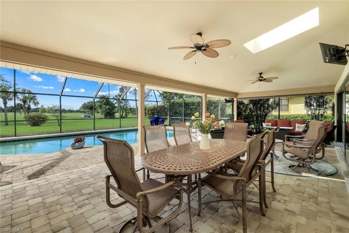 This Paver Under Truss Lanai Measures Nearly 35' Long, Multiple Hurricane Rated Sliders Pocket, Patio Furnishings Stay!