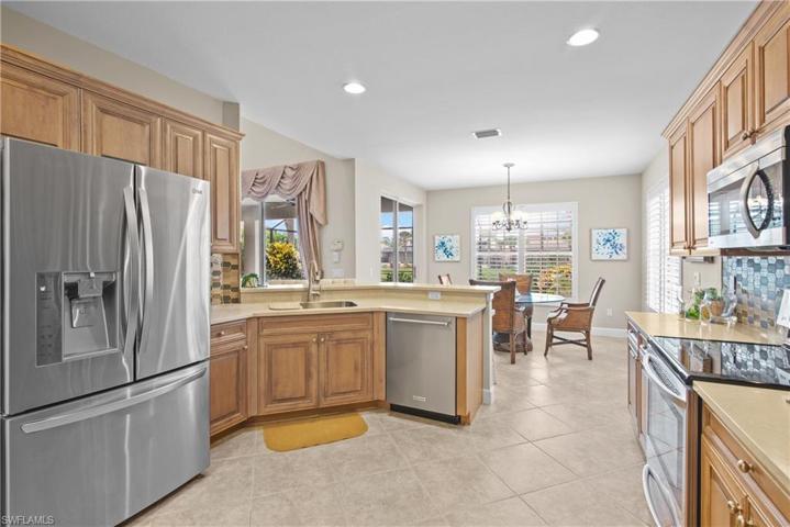 remodeled kitchen open to dining