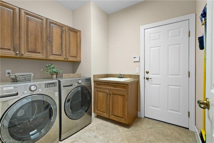 large laundry with tub