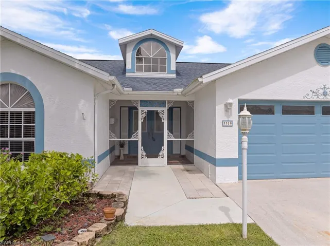 Outside Front screened in double door Entrance.