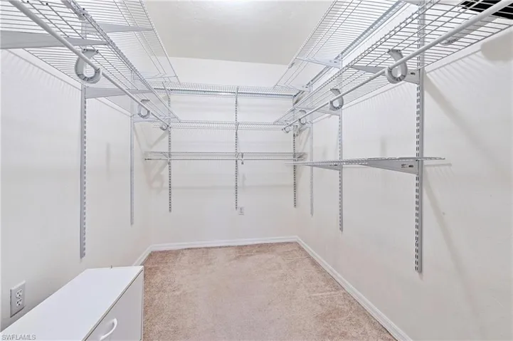 Large walk in closet in primary bedroom.