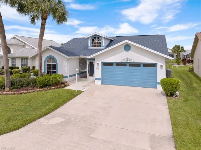 Front entrance and 2 car garage.