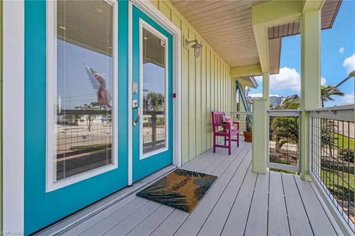 Deck featuring covered porch