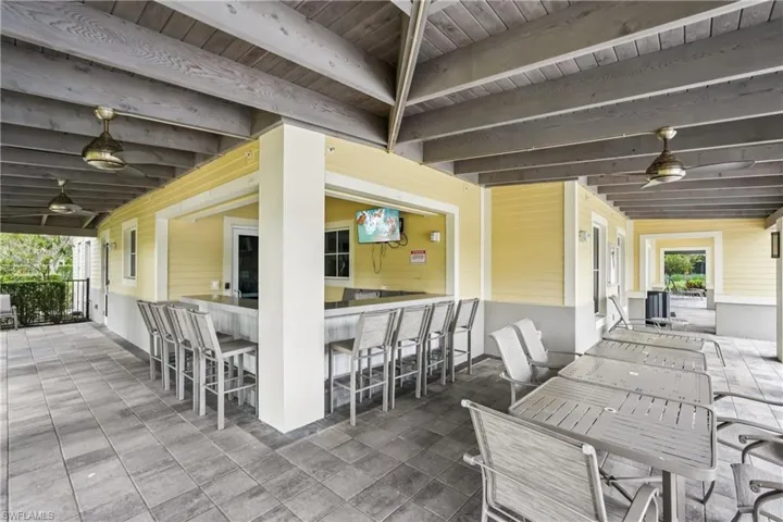 View of patio / terrace featuring ceiling fan and outdoor dining area