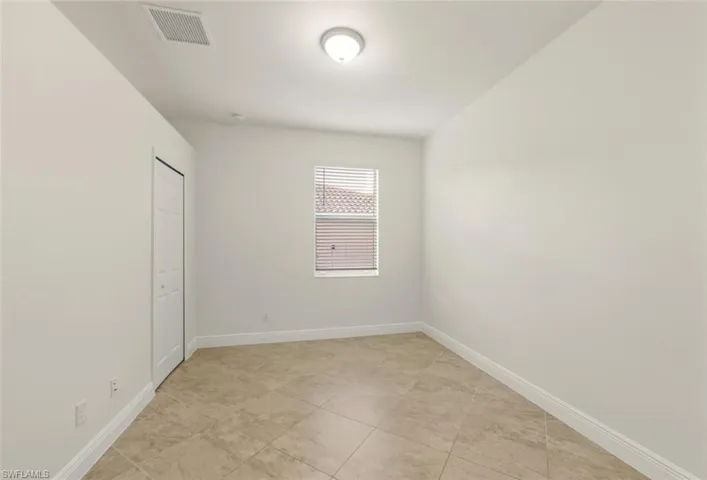 Spare room with baseboards