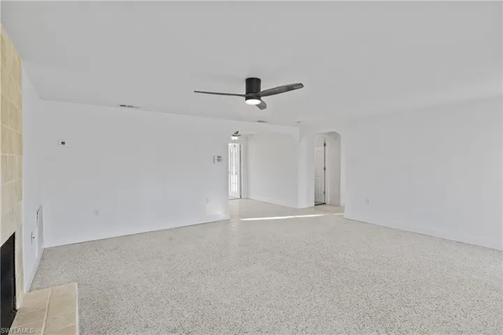 Comfortable gathering space with natural light, perfect for relaxing or entertaining.