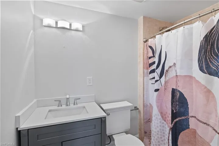 Stylish, renovated baths combining functionality with island charm.