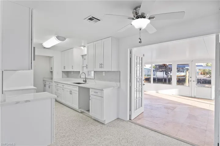 Cozy dining space perfectly positioned for enjoying meals with views of the surrounding island setting.