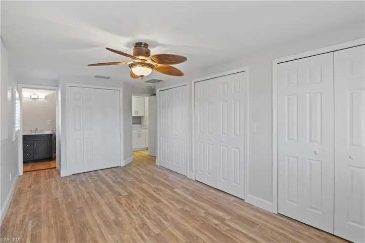 Spacious primary suite with plenty of natural light and serene ambiance.